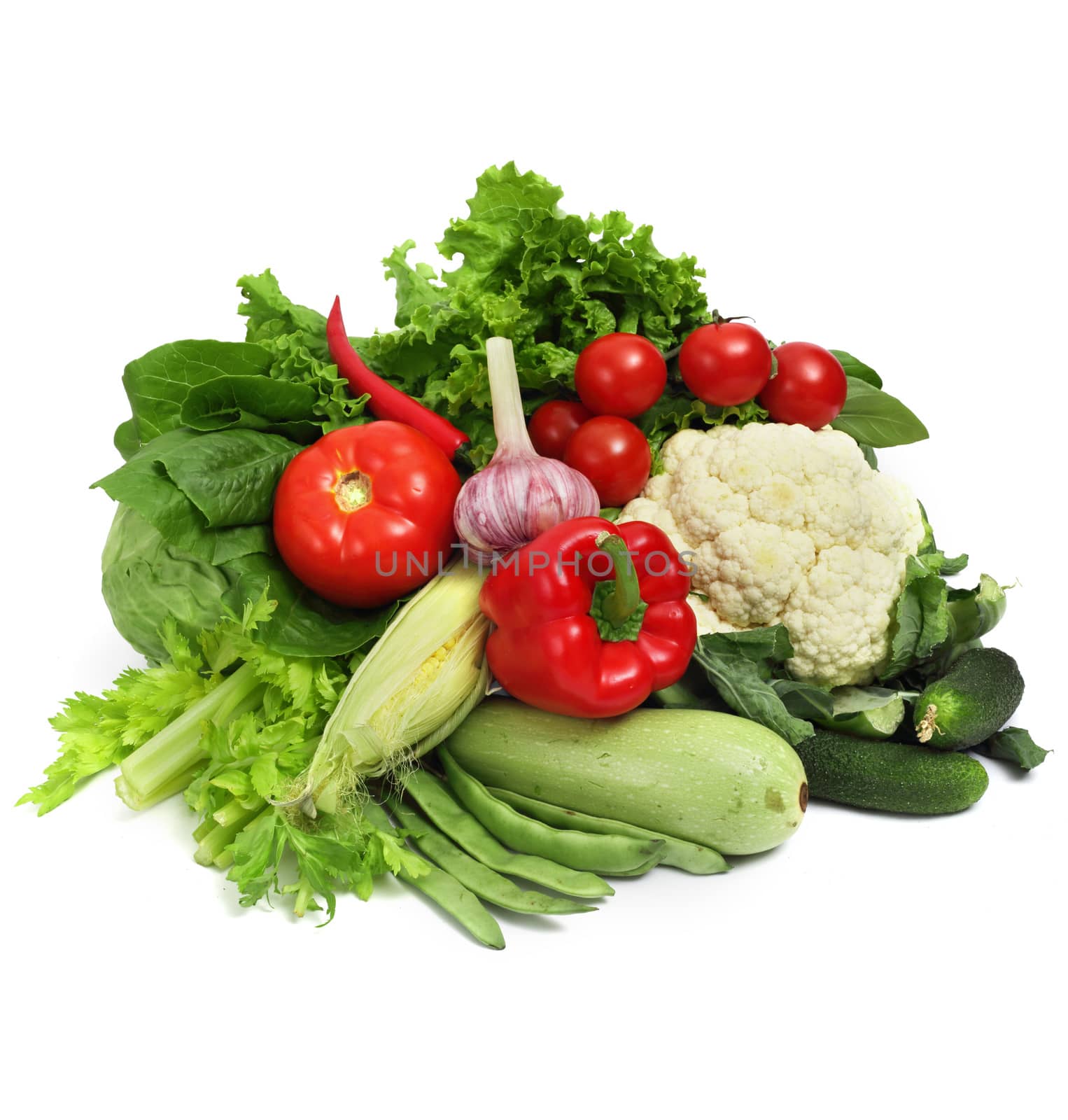 Pile of fresh vegetables isolated on white background