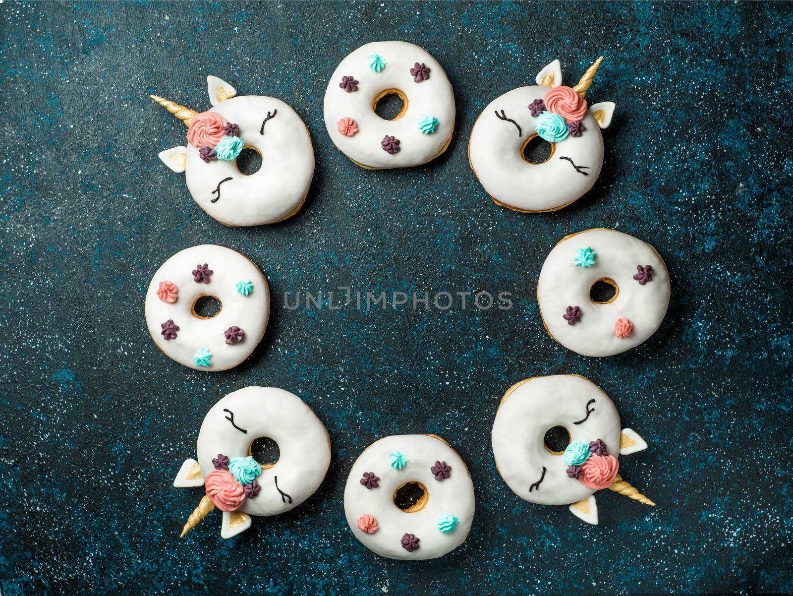 Unicorn donuts with copy space by fascinadora