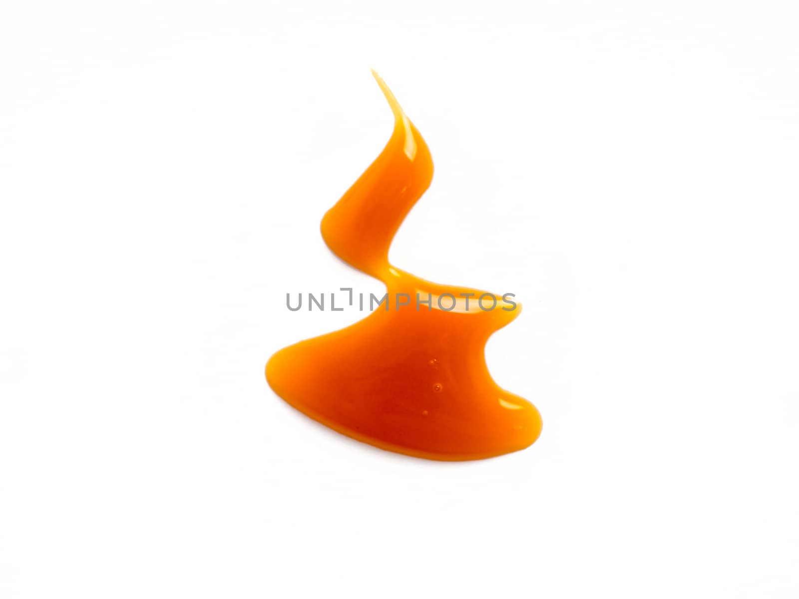 sweet caramel sauce isolated on white background Top view or flat lay. Caramel isolated on white with clipping path.