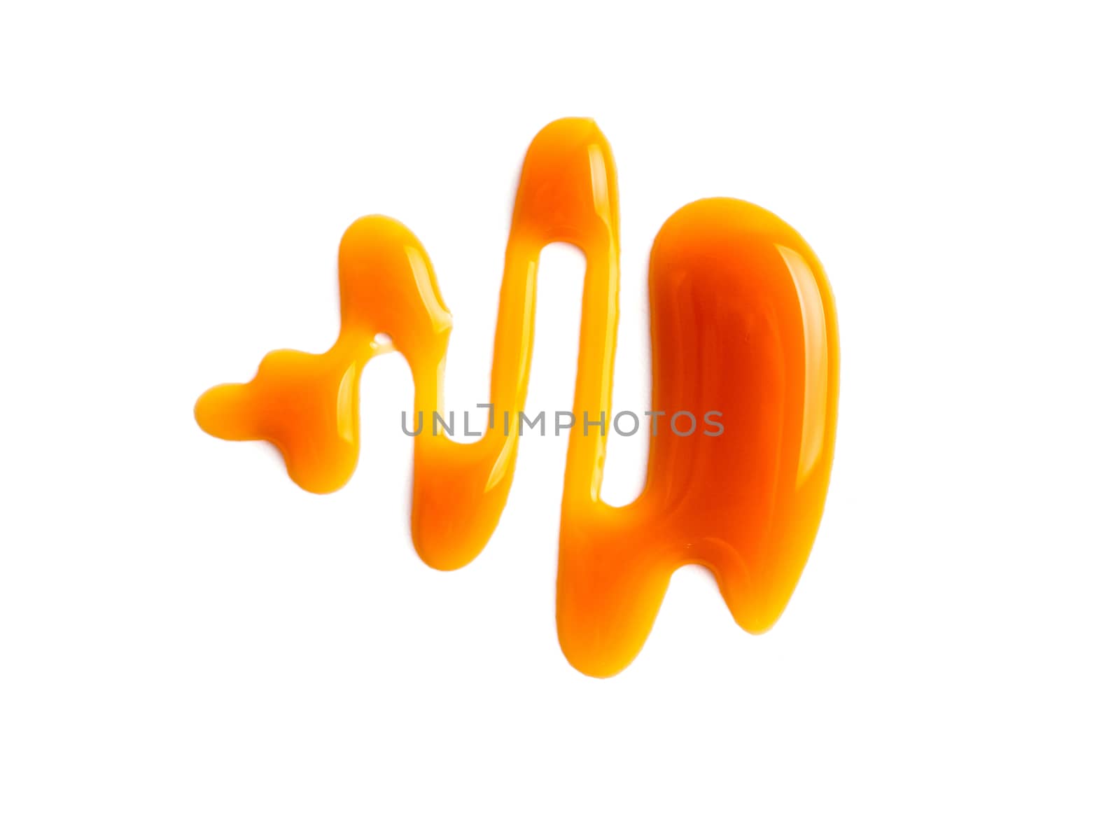sweet caramel sauce isolated on white background Top view or flat lay. Caramel isolated on white with clipping path.