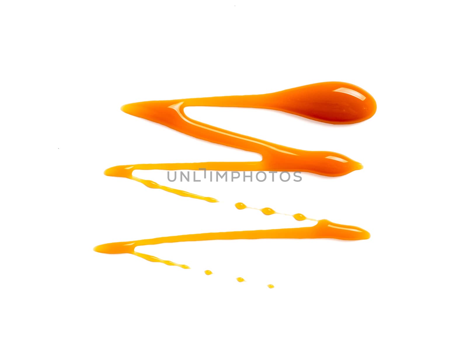 sweet caramel sauce isolated on white background Top view or flat lay. Caramel isolated on white with clipping path.