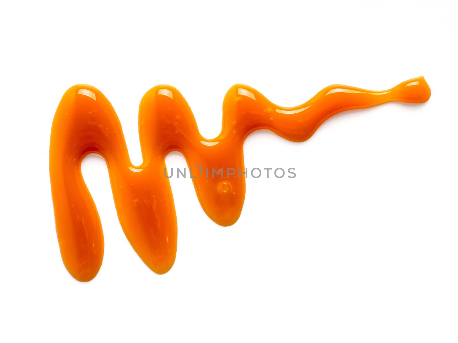 sweet caramel sauce isolated on white background Top view or flat lay. Caramel isolated on white with clipping path.