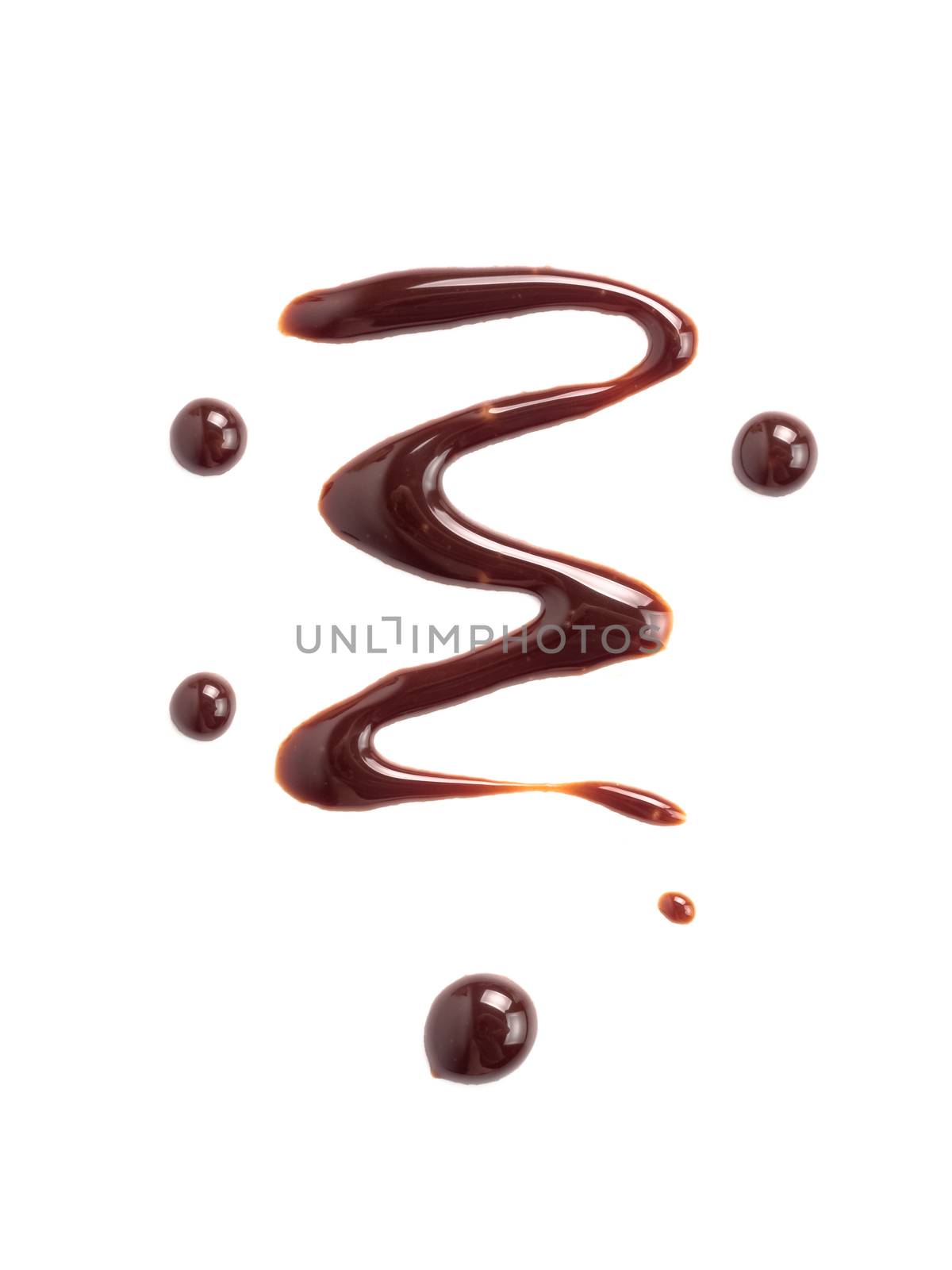 Chocolate sauce isolated on white background by fascinadora