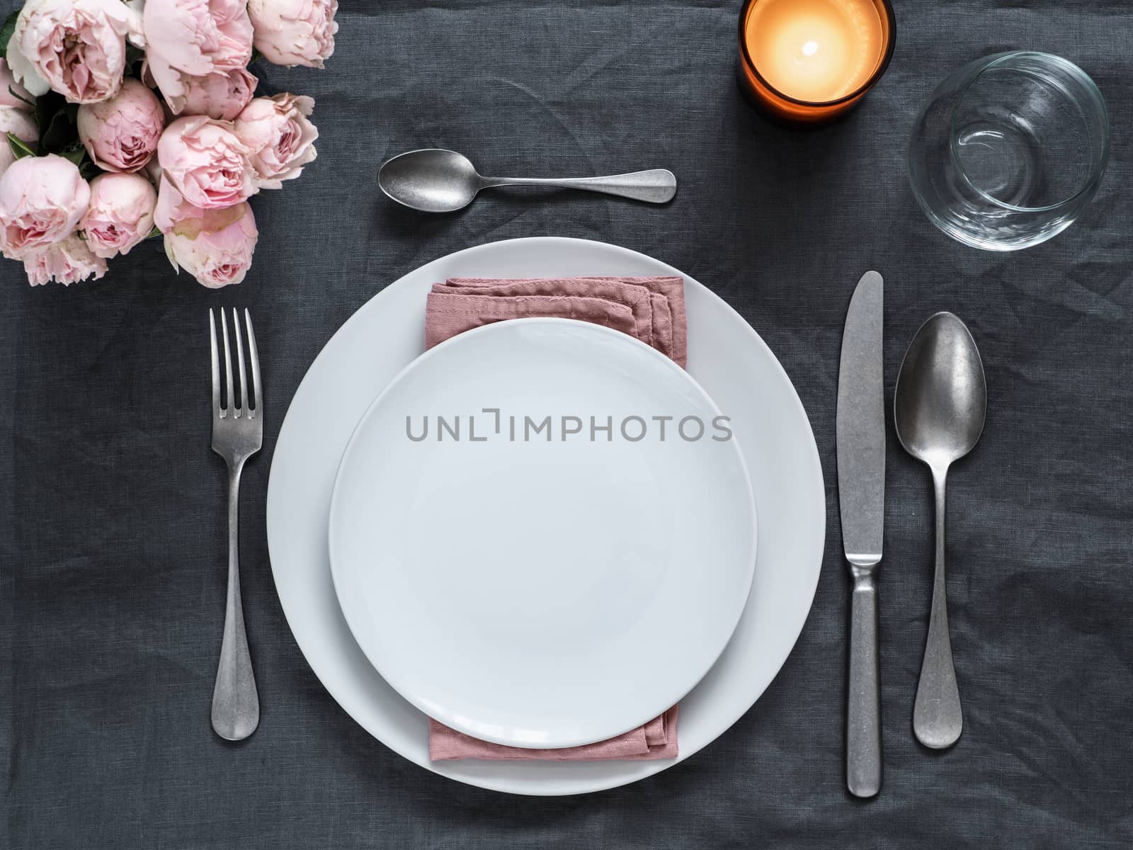 Beautiful table setting on gray linen tablecloth by fascinadora