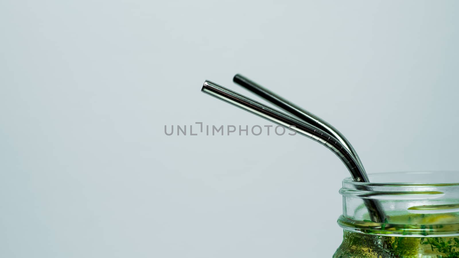 Metal recyclable drinking straws, copy space by fascinadora