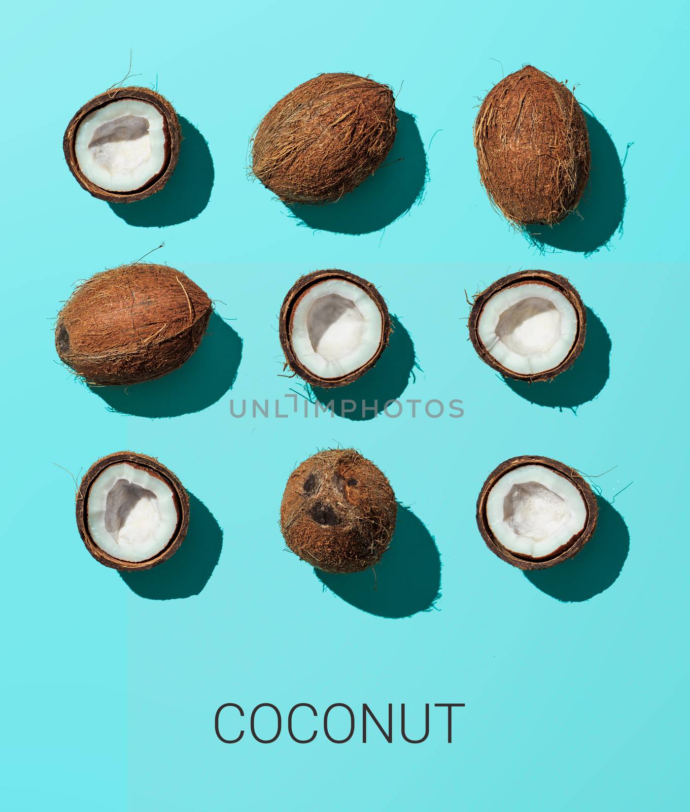 Coconuts on blue background, top view by fascinadora