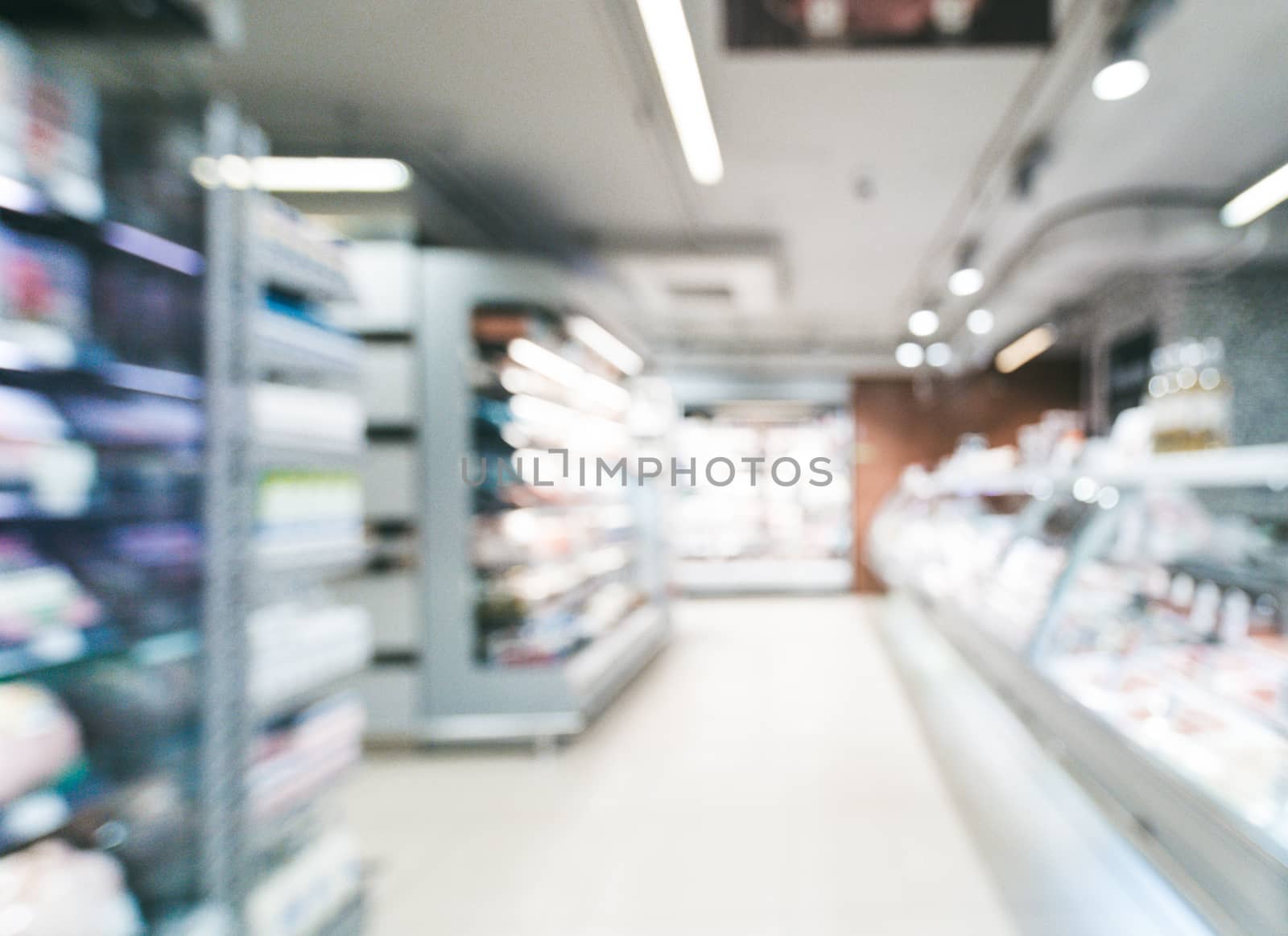 blurred supermarket aisle by fascinadora