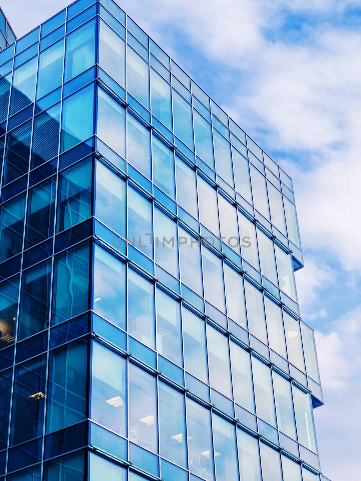 Modern building exterior with copy space. Modern office building with facade of glass.