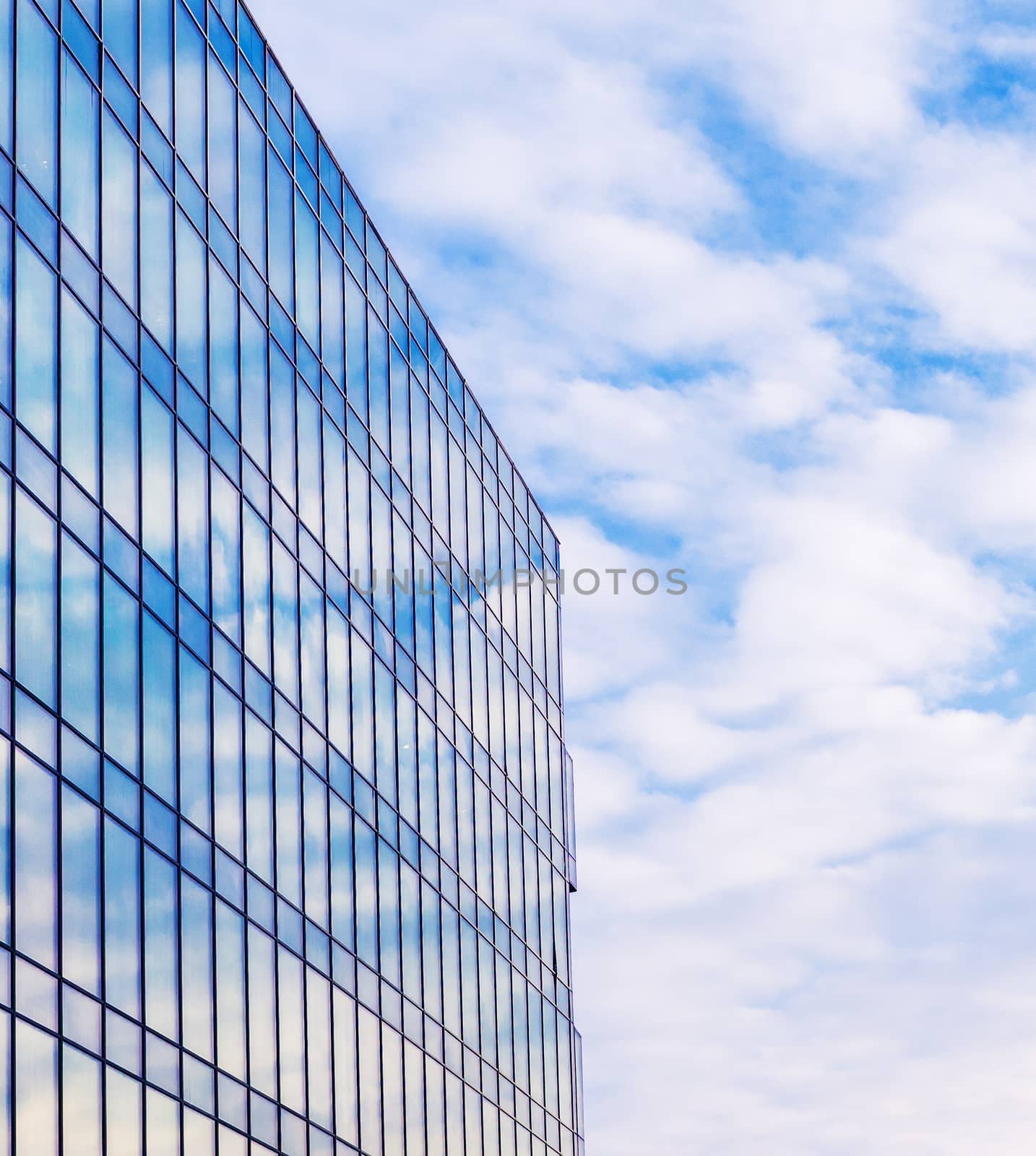 Modern building exterior with copy space. Modern office building with facade of glass.