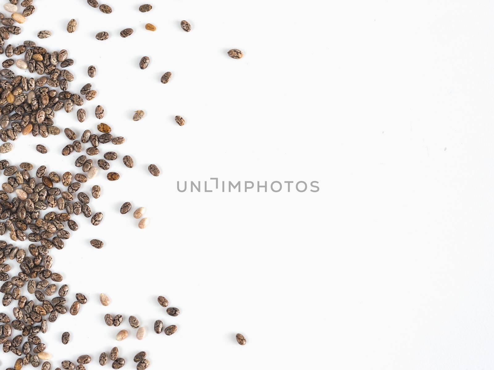 Chia seeds isolated on white by fascinadora