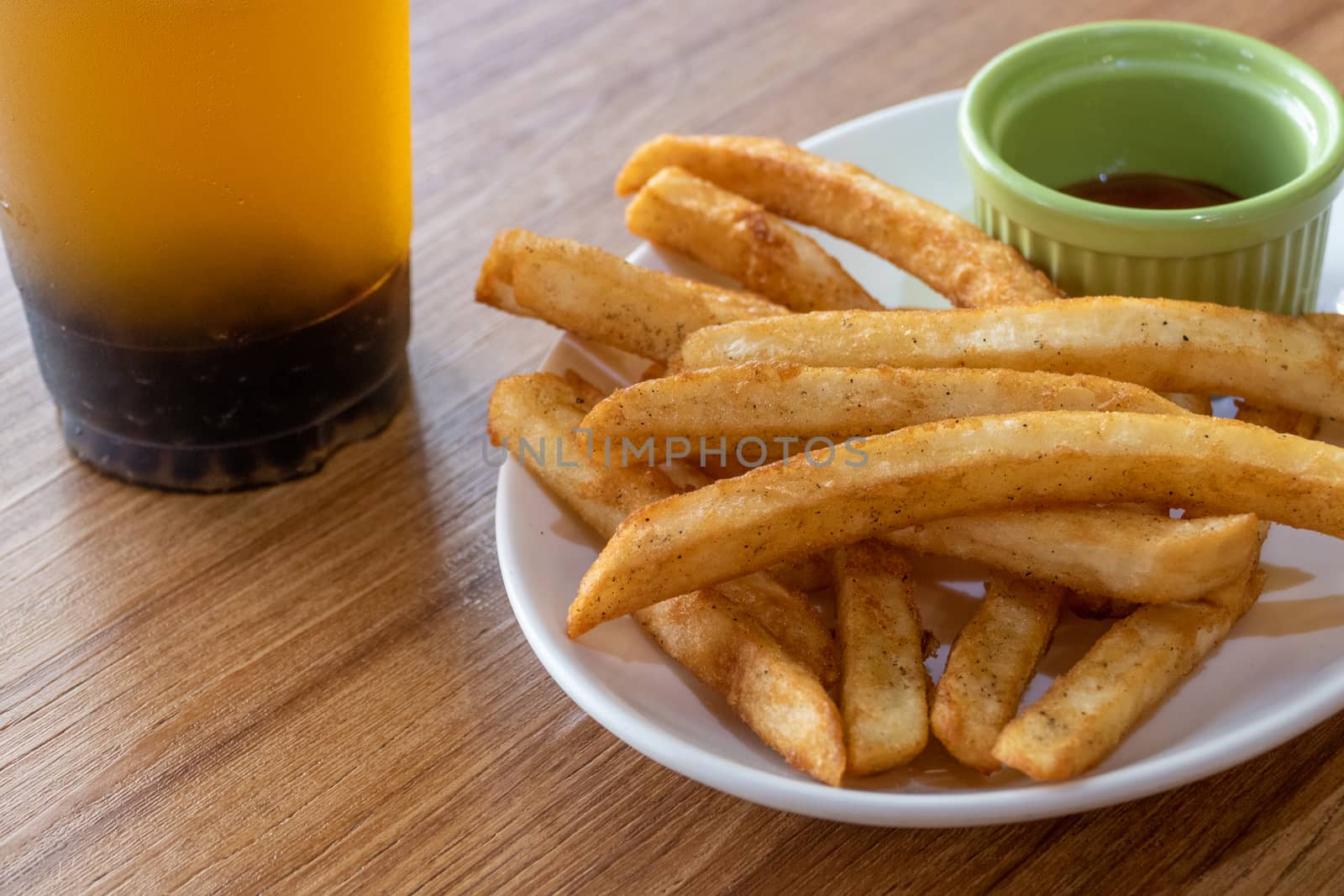French fries and ketchup on plate