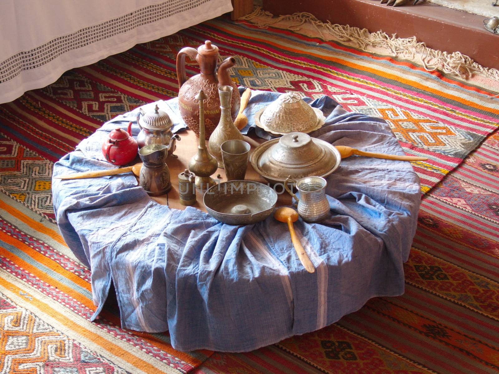old turkish ottoman dinner table. historic kitchen utensils