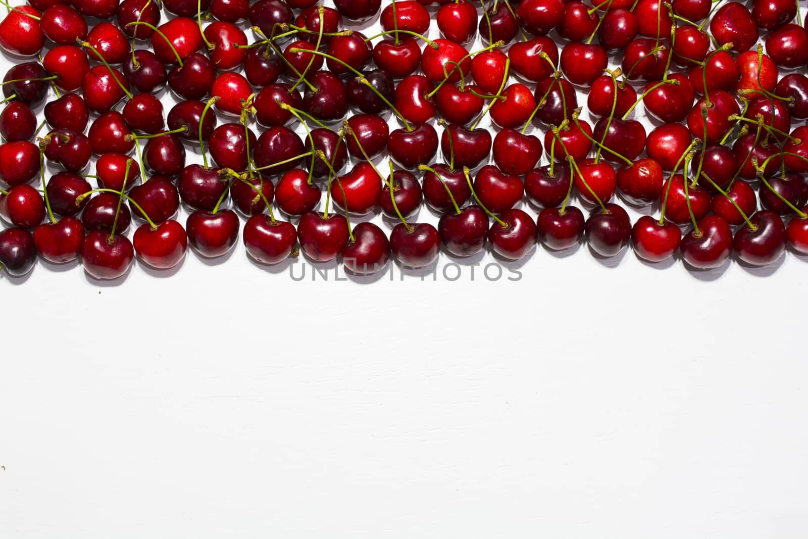 cherry fruit frame. table cherry background. Organic food background. isolated white background. Top view. Free space for your text