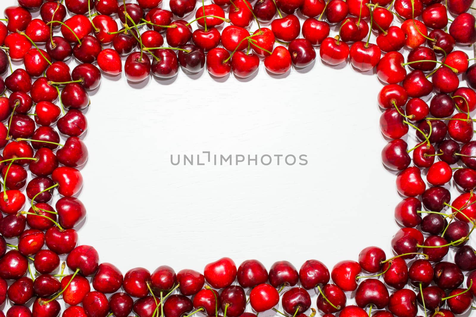 cherry fruit frame. table cherry background. Organic food background. isolated white background. Top view. Free space for your text