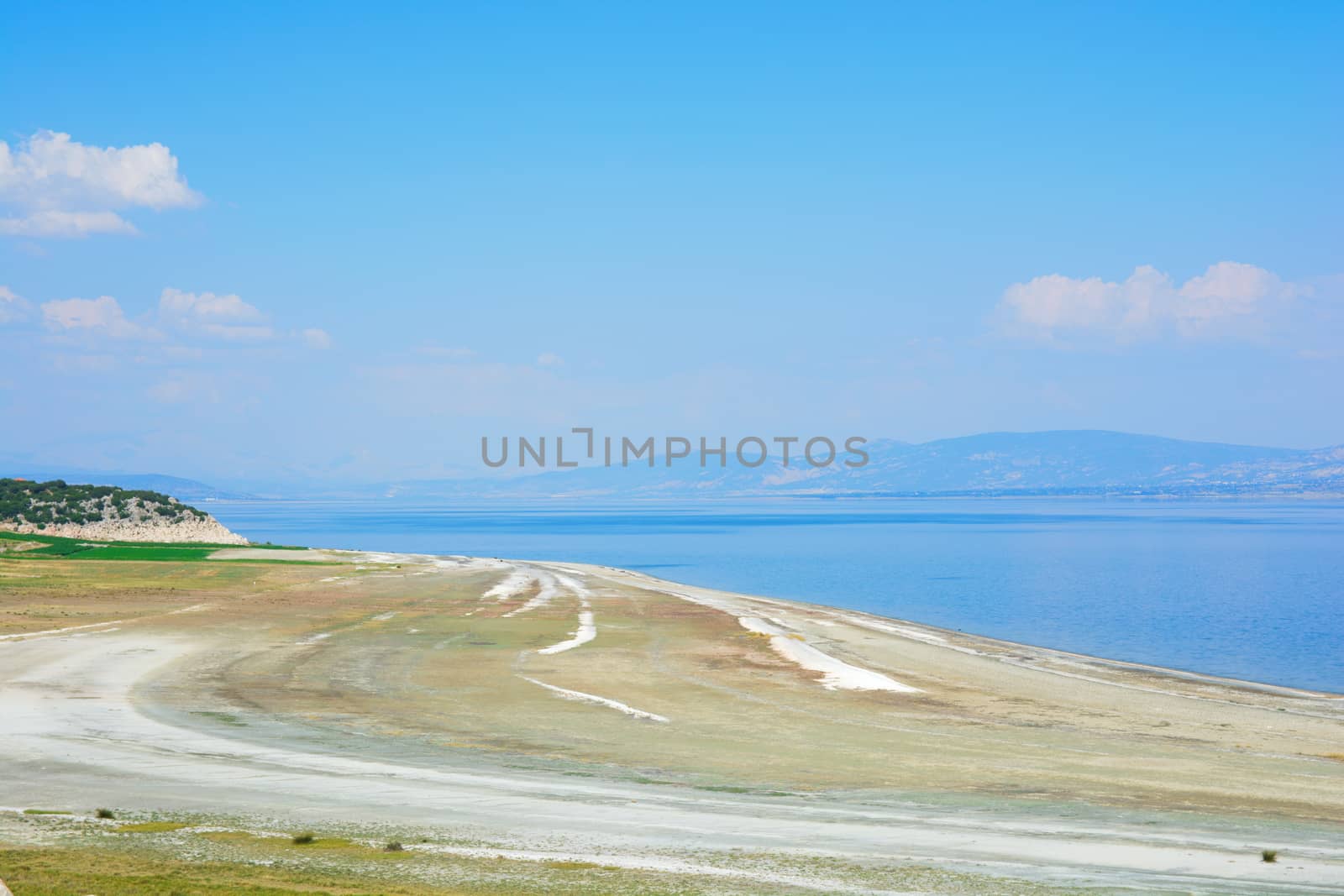 Lakeside. the lake shore and the natural pathway along the road