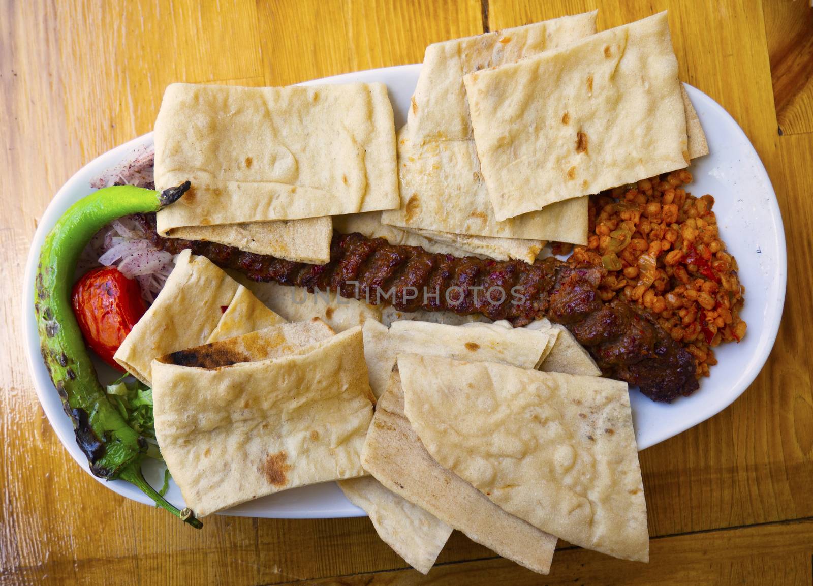"Adana Kebab"(minced), Adana / Turkey is a special kebabs. sheep meat is chopped with a sharp knife called armor.