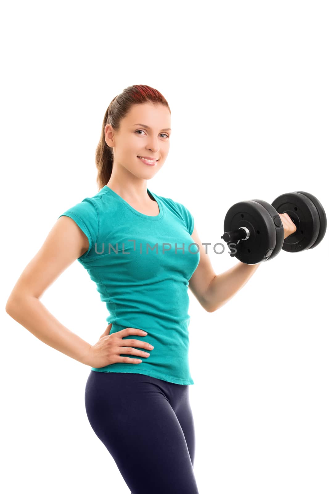 A portrait of a beautiful fit young girl holding a dumbbell, isolated on white background. Beautiful fit young girl lifting a dumbbell, isolated on a white background.