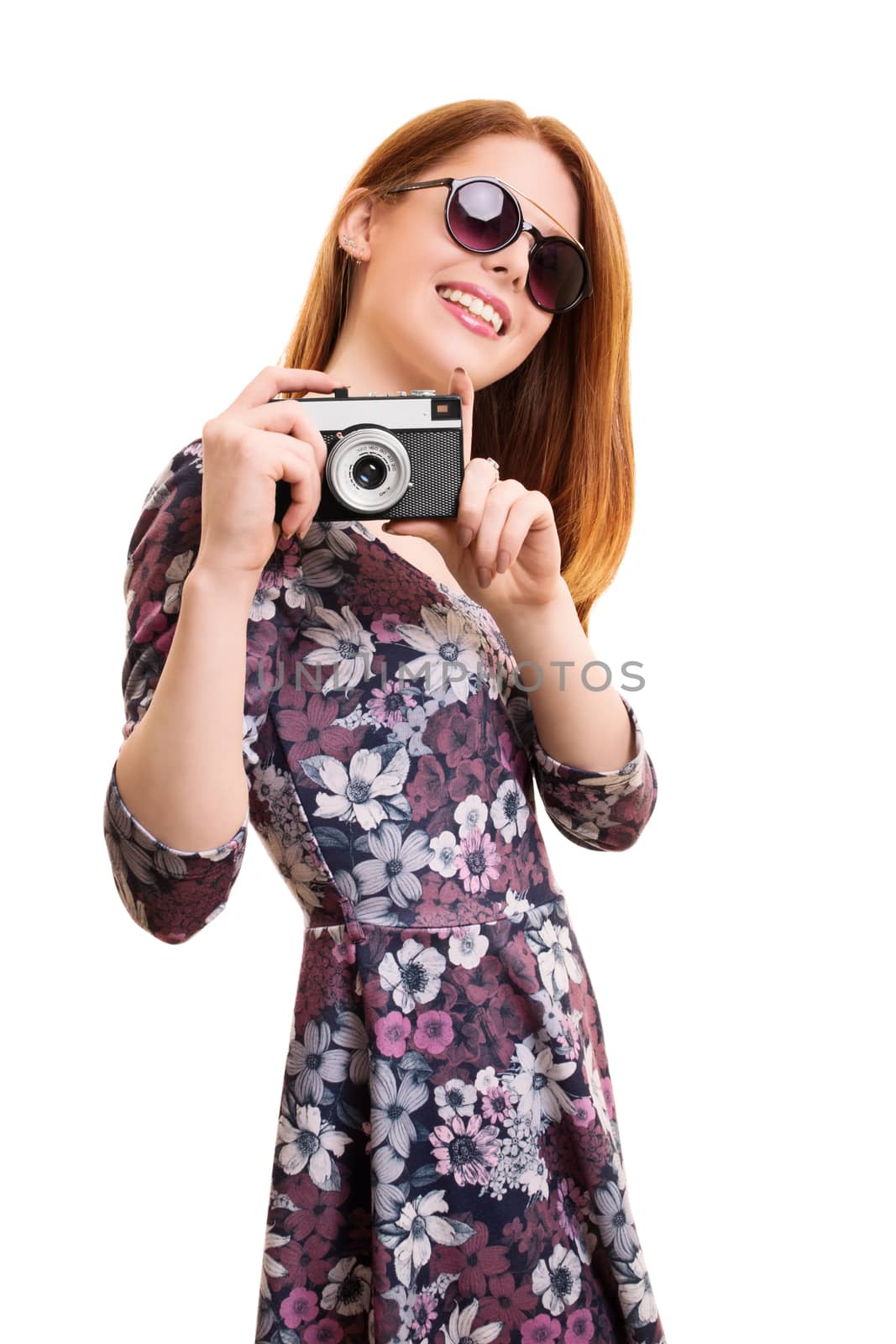 Beautiful young girl taking a photo by Mendelex