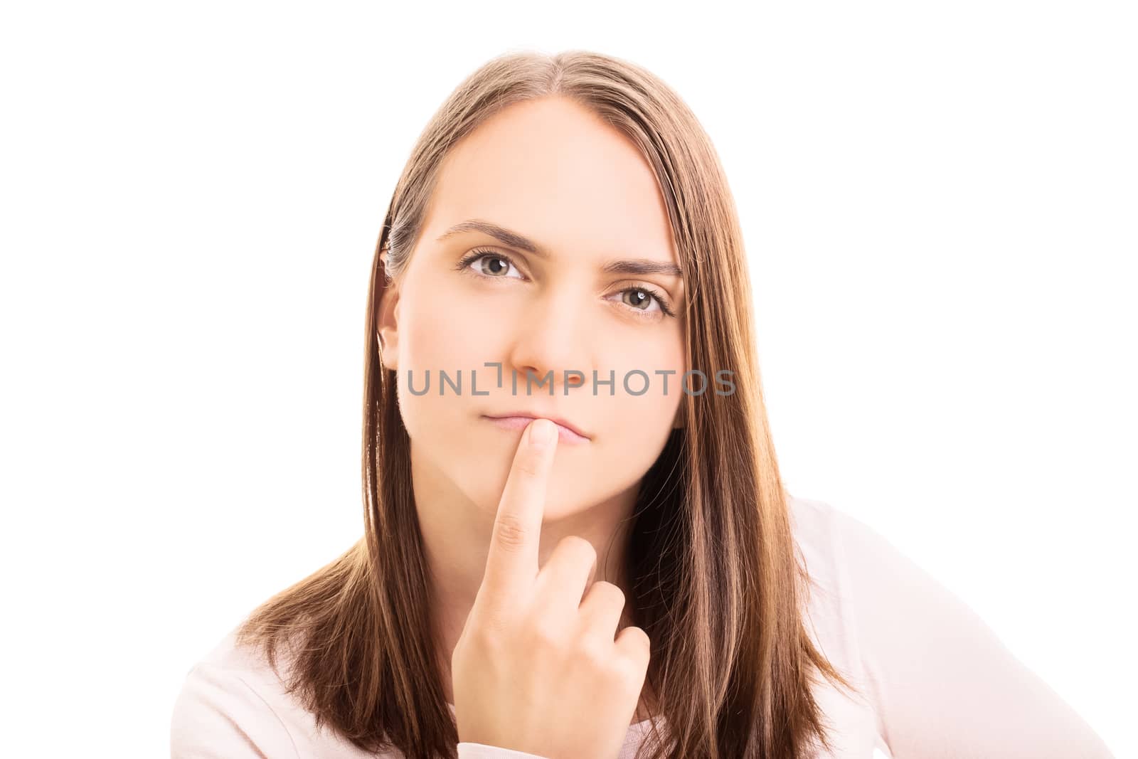 Close up shot of a beautiful young girl thinking of something, isolated on white background.