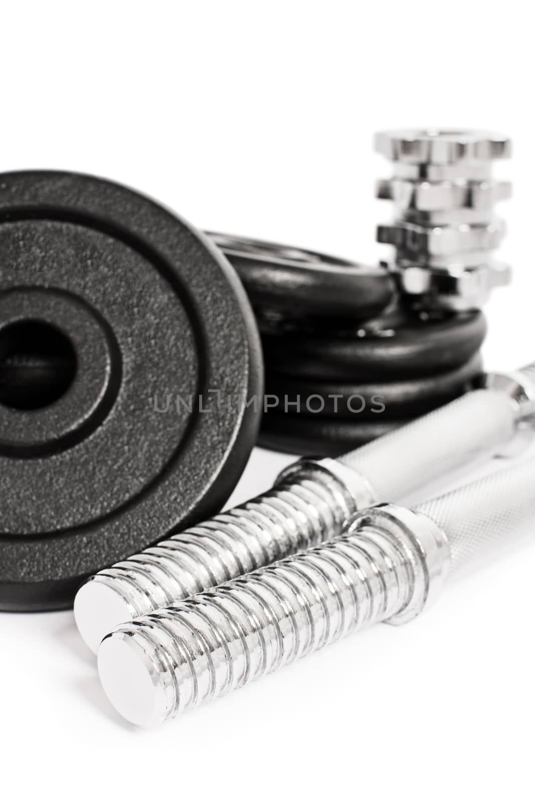 Close up shot of disassembled dumbbell, isolated on a white background.