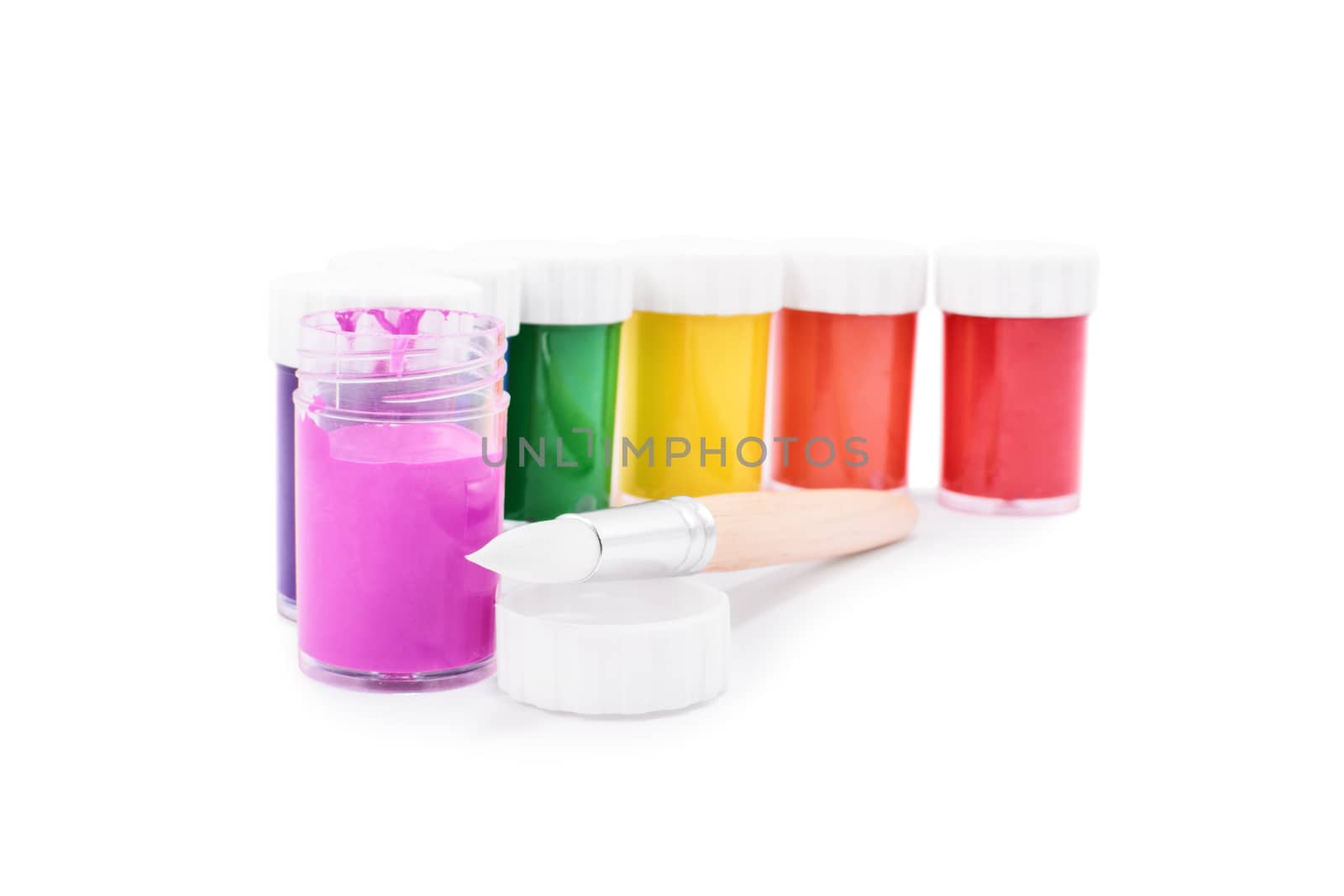 Color paint containers and a paint brush, isolated on white background.