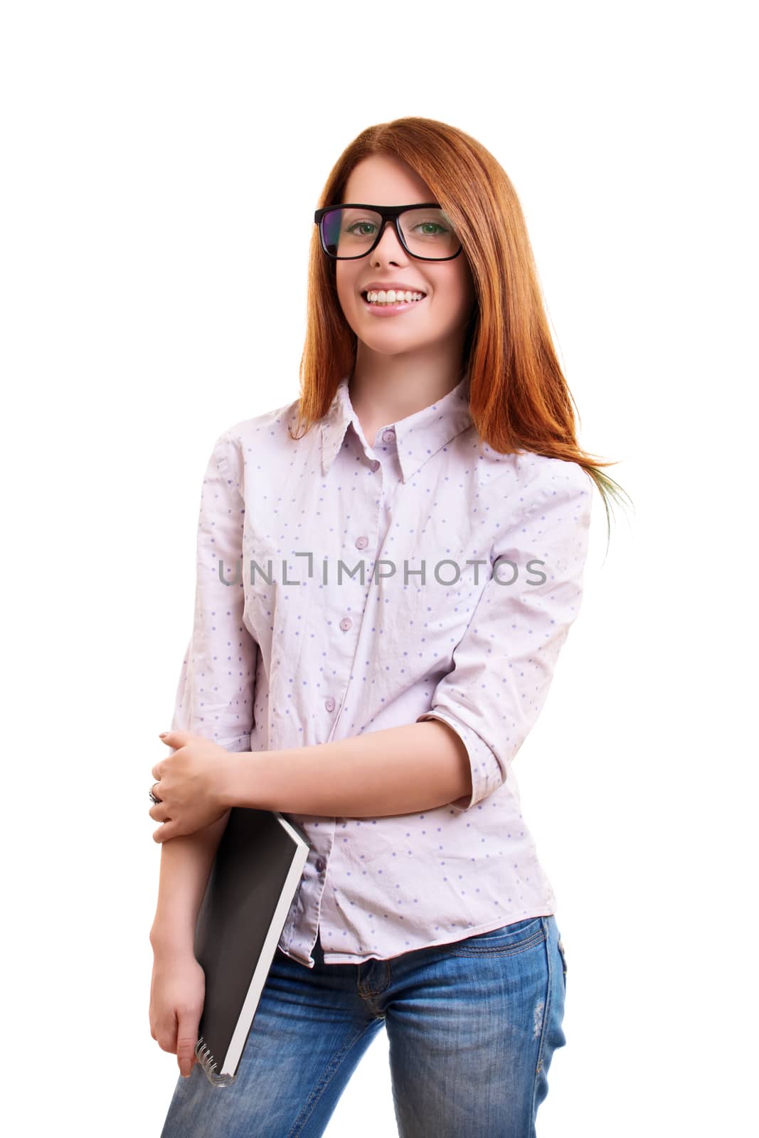 A portrait of a smiling cute nerd girl with glasses, holding a notebook, isolated on white background. I can't wait to go back to school.