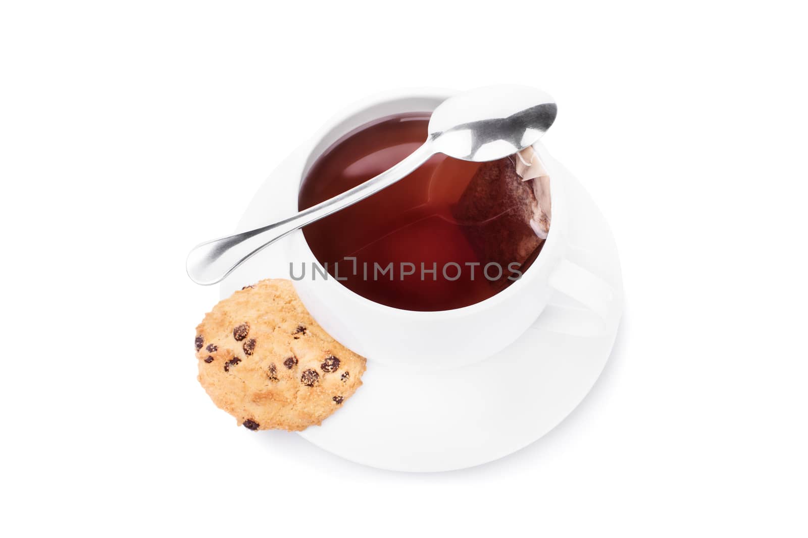 Cup of tea with cookie and a small spoon, isolated on white background.