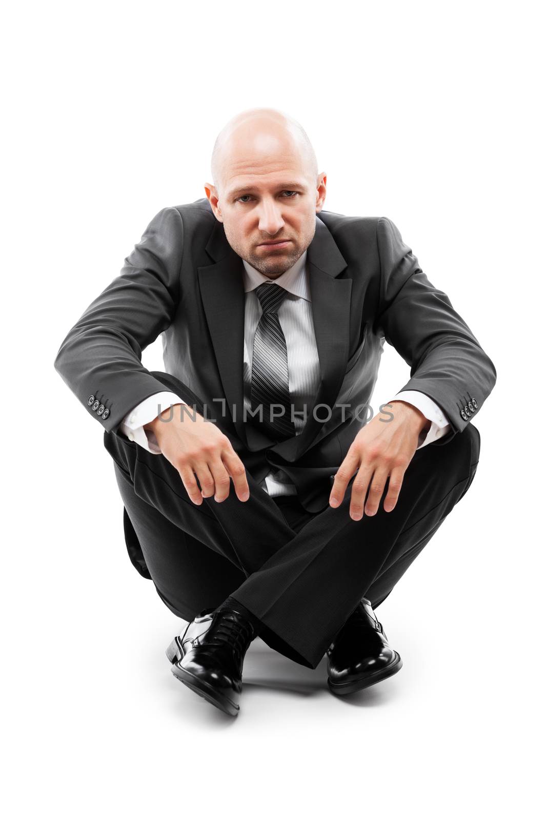Business problems and failure at work concept - unhappy tired or stressed businessman in depression sitting floor white isolated
