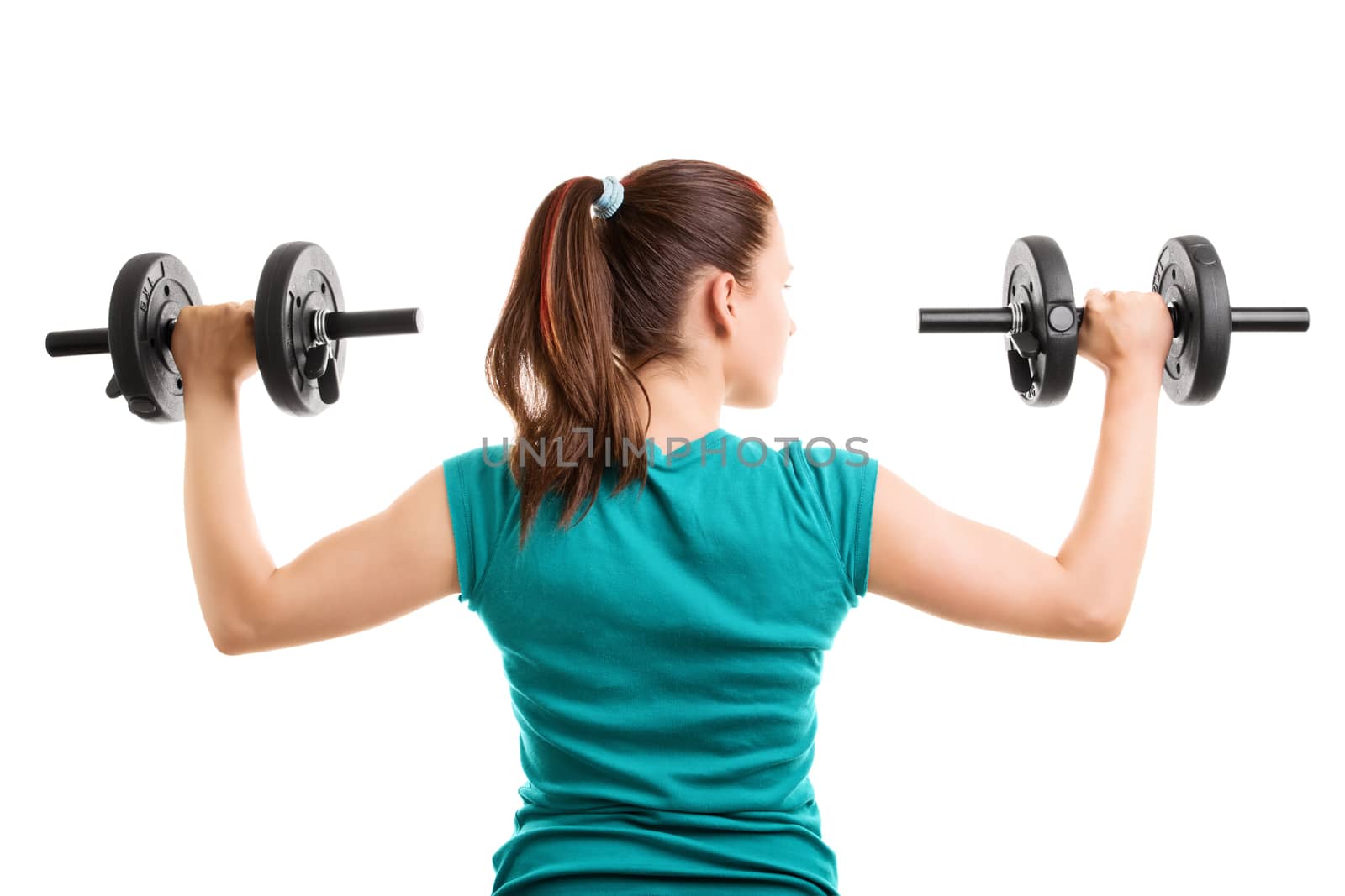 Fit young woman doing shoulder raises with dumbbells, isolated on white background.