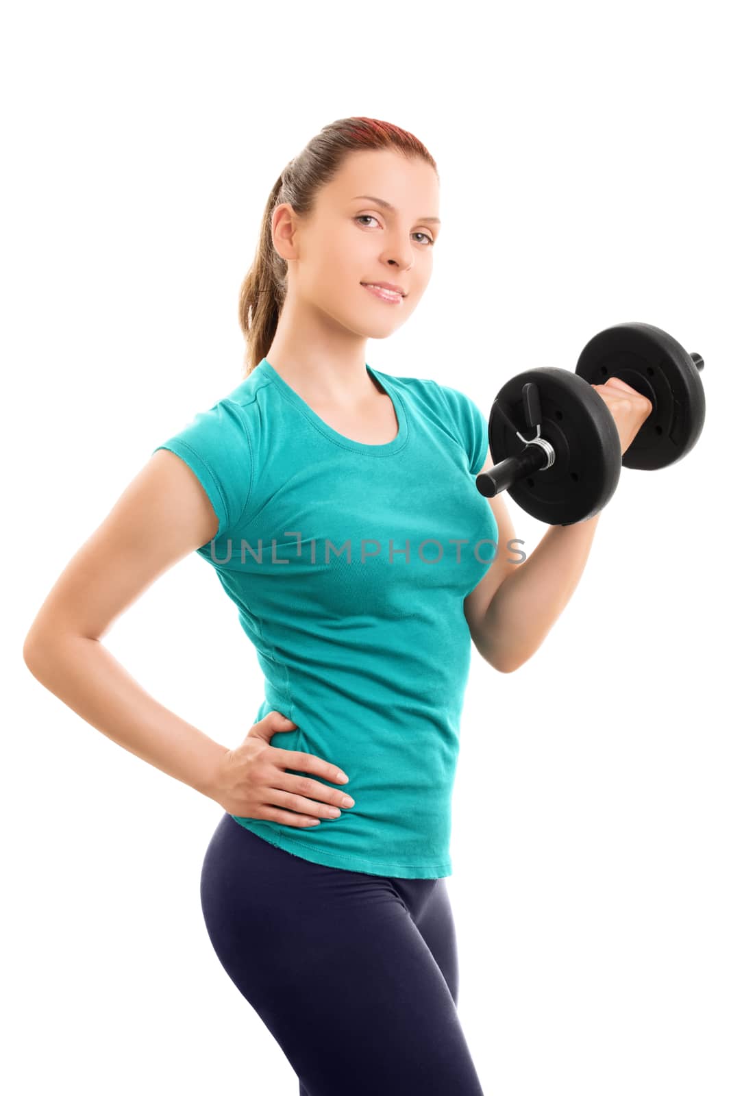 A portrait of a beautiful fit young girl holding a dumbbell, isolated on white background.