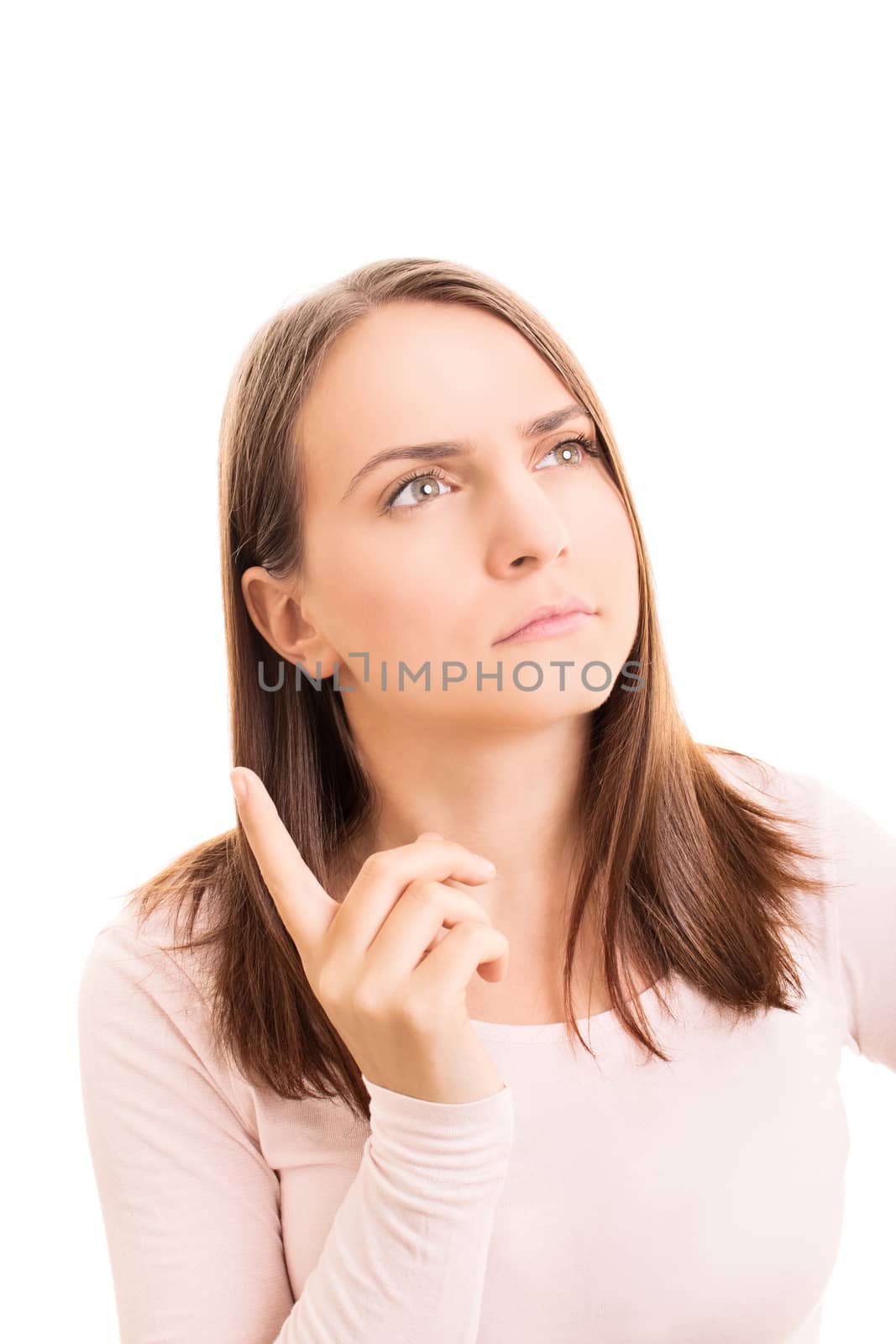 Beautiful young girl figuring out an idea she had before, isolated on white background.