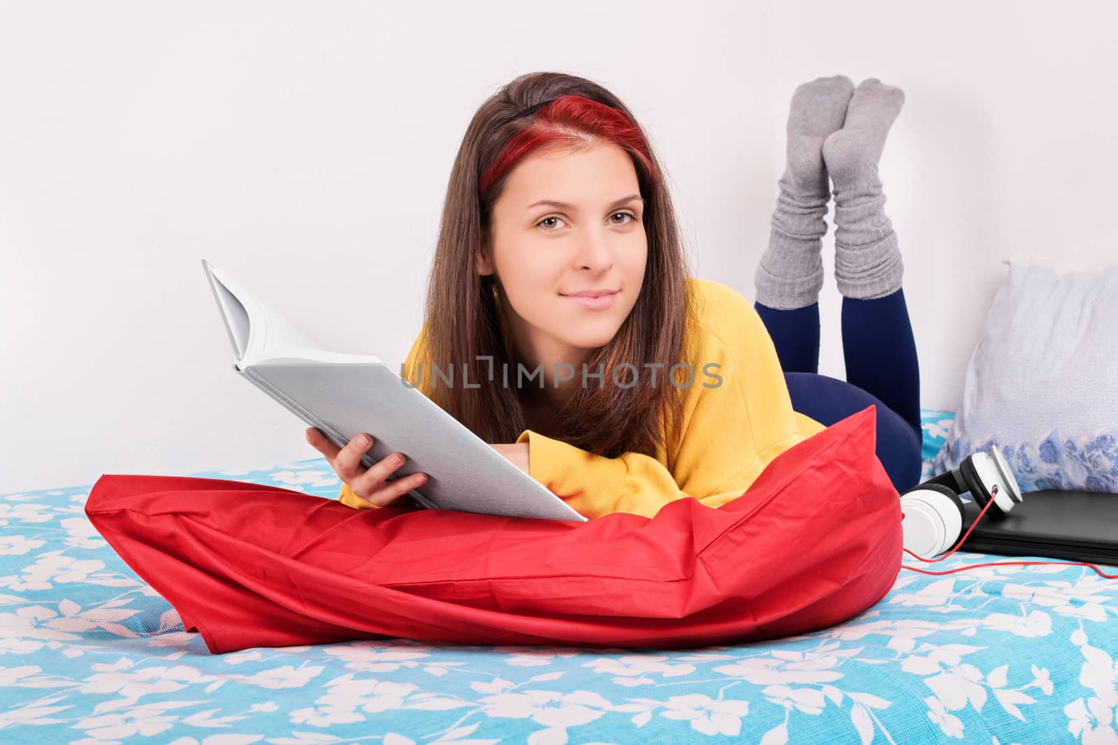 Portrait of a girl in her bed reading a book by Mendelex