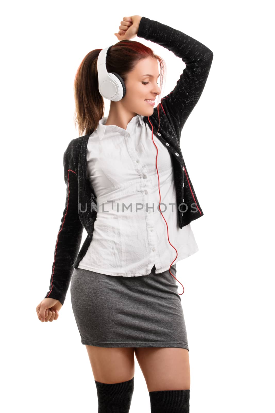 School girl listening to music by Mendelex