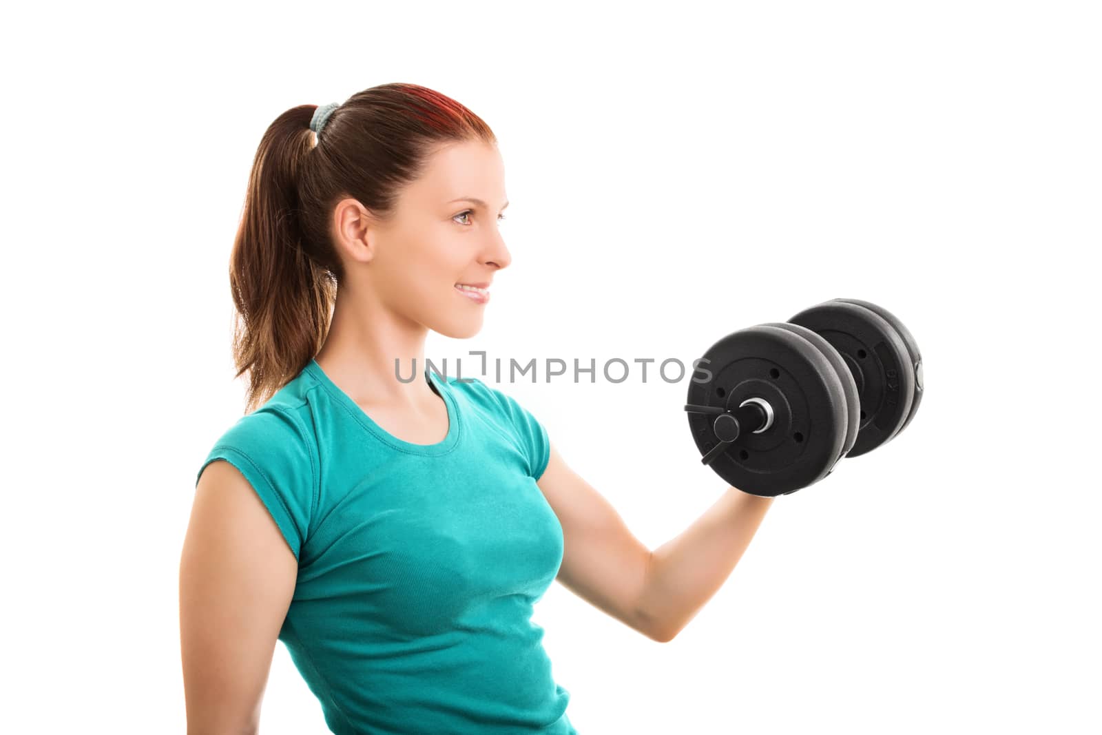 A portrait shot of a beautiful fit girl smiling and lifting a dumbbell, isolated on white background.