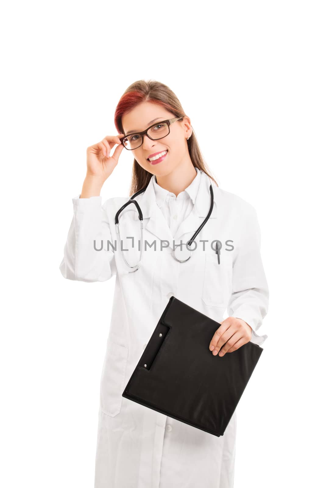 We're here for you. Portrait of a smiling beautiful febale doctor holding a notepad, isolated on white background.