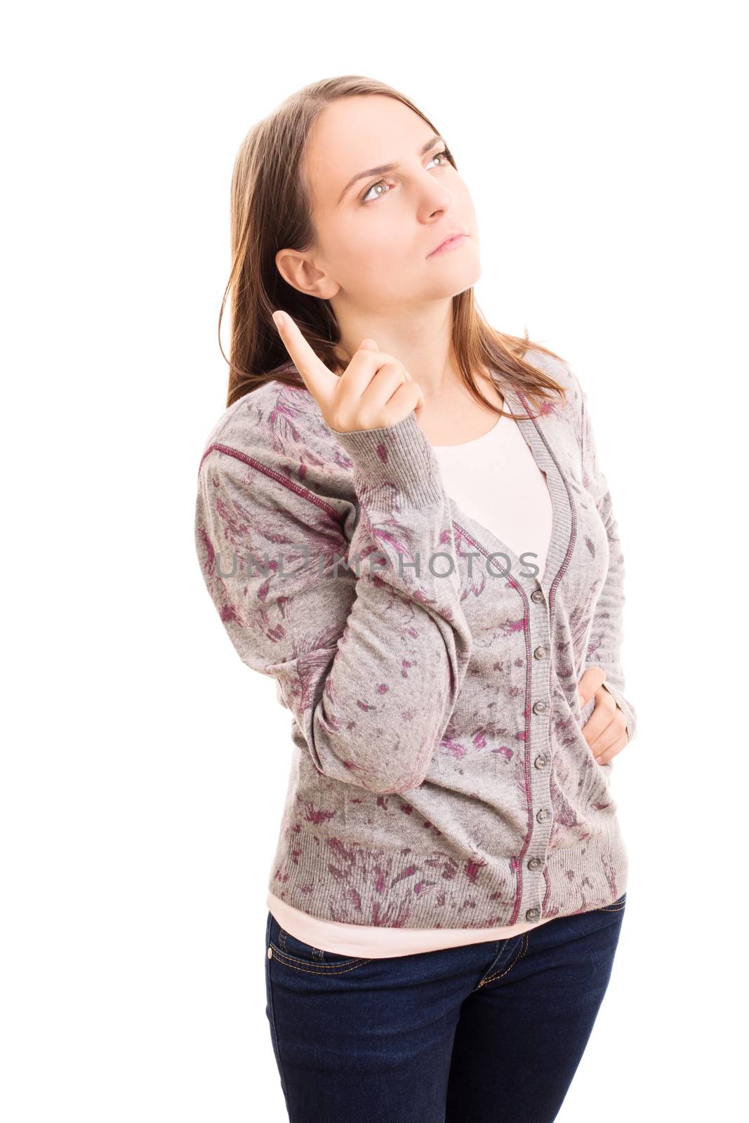 Beautiful young girl holding her point finger up thinking about something, isolated on white background.