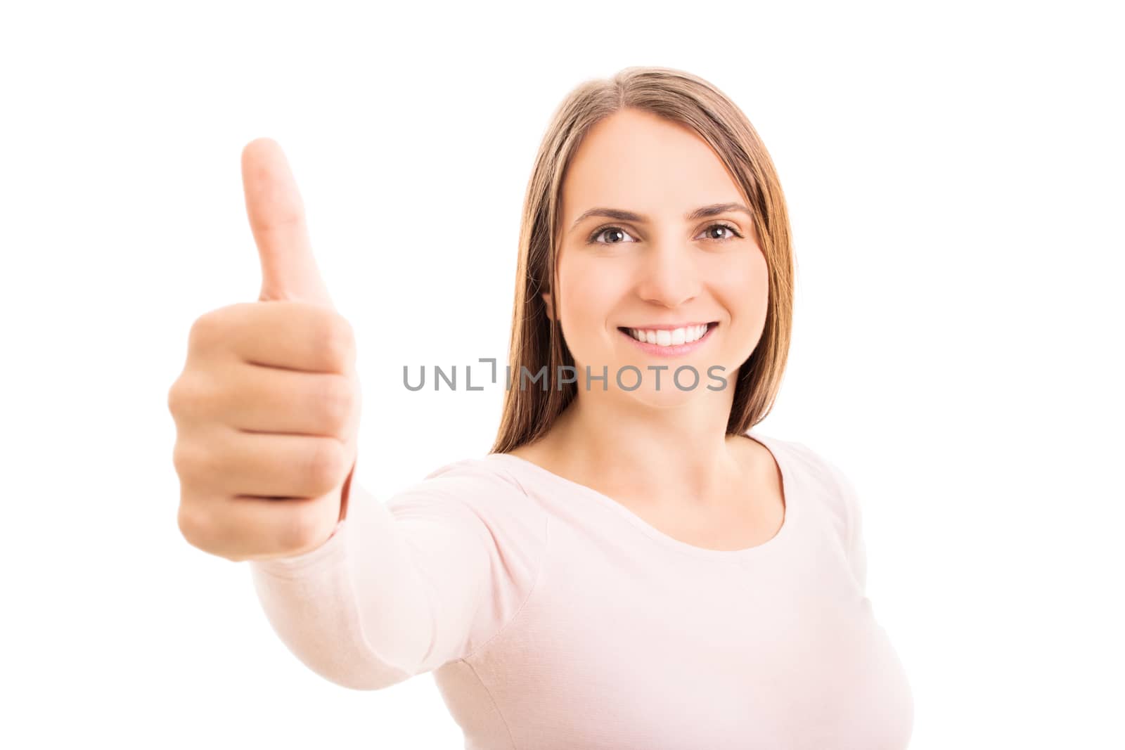 Smiling beautiful young woman giving thumbs up, isolated on white background. Good choice!