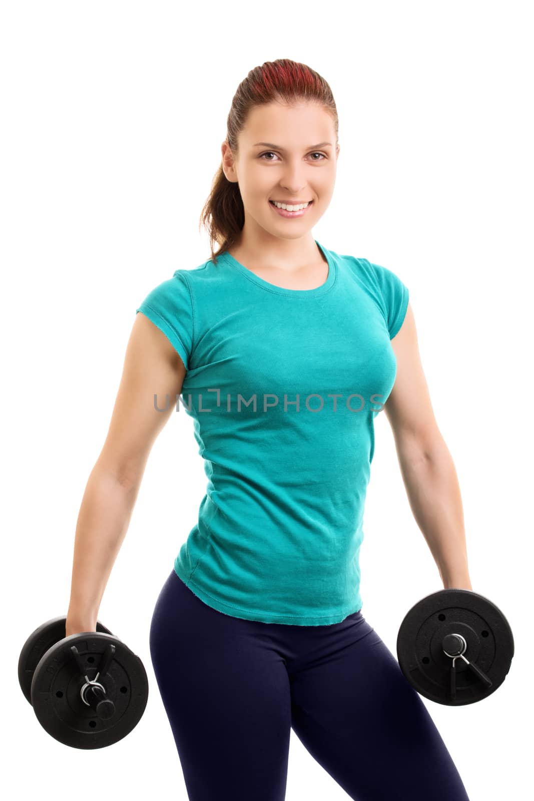The looks. Beautiful young athlete holding two dumbbells, isolated on white background.