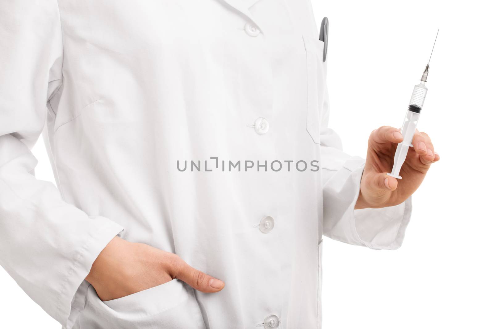 Young doctor holding a syringe and needle by Mendelex