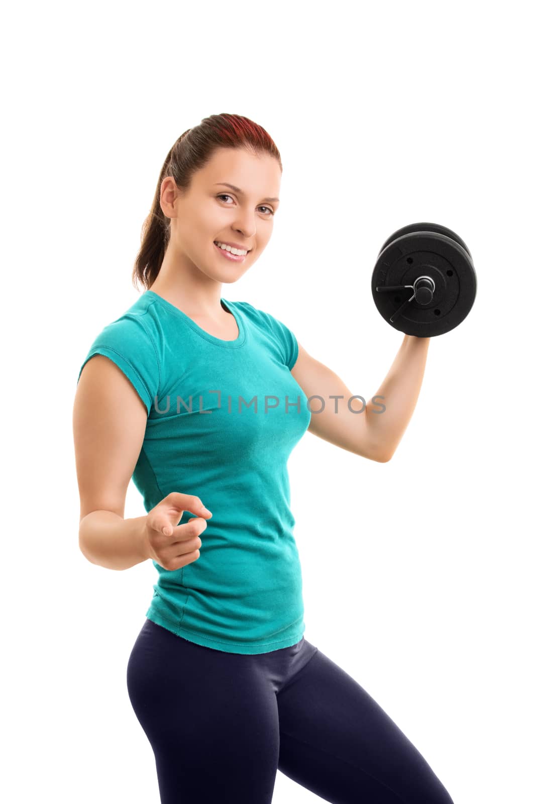 I pull my weight. I exercise. Do you?Beautiful young girl lifting weights and pointing towards you, isolated on white background.