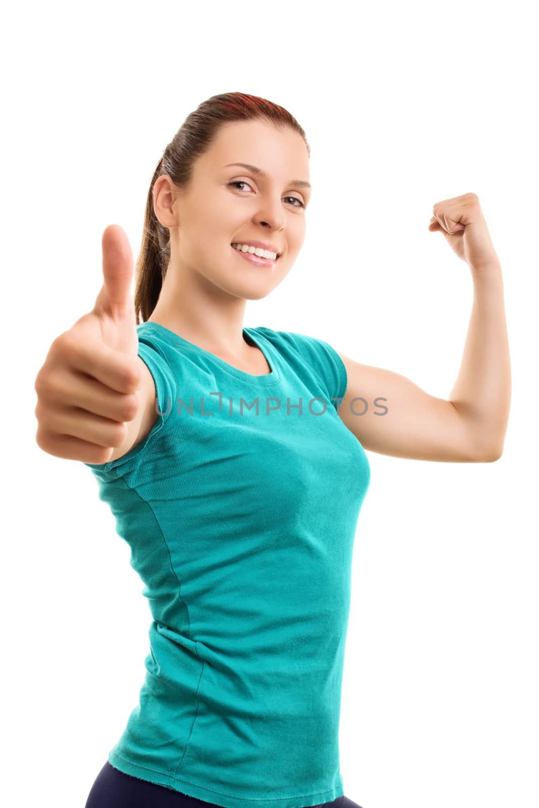 Willpower and strength to be fit. Smiling young athlete giving thumbs up, isolated on white background.