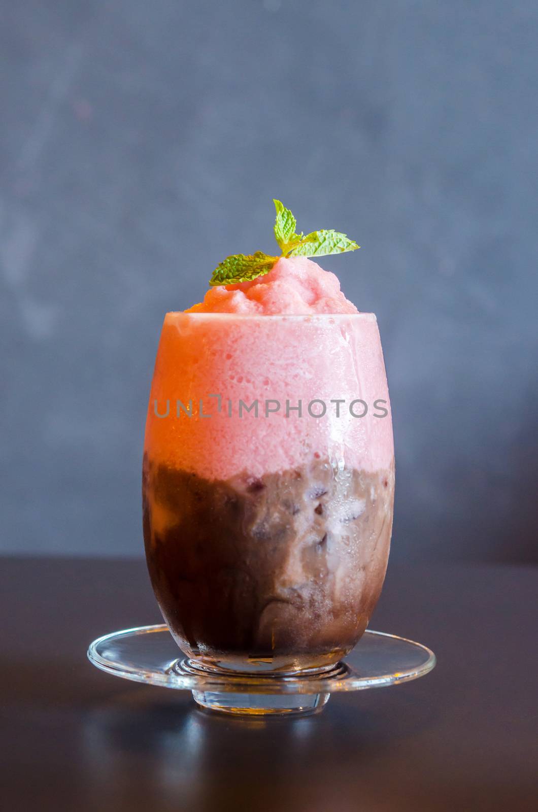 Chocolate and strawberry smoothie on table in resturant bar.