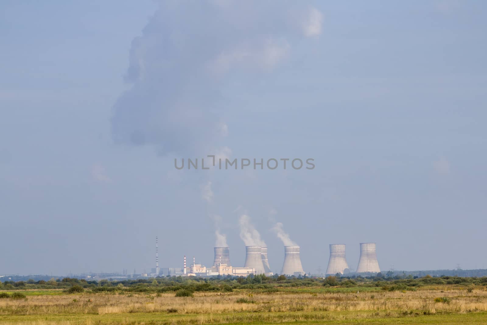 Radiation nuclear station like Chernobyl. NPP working far. Soviet nuclear station. Power plant produces electricity