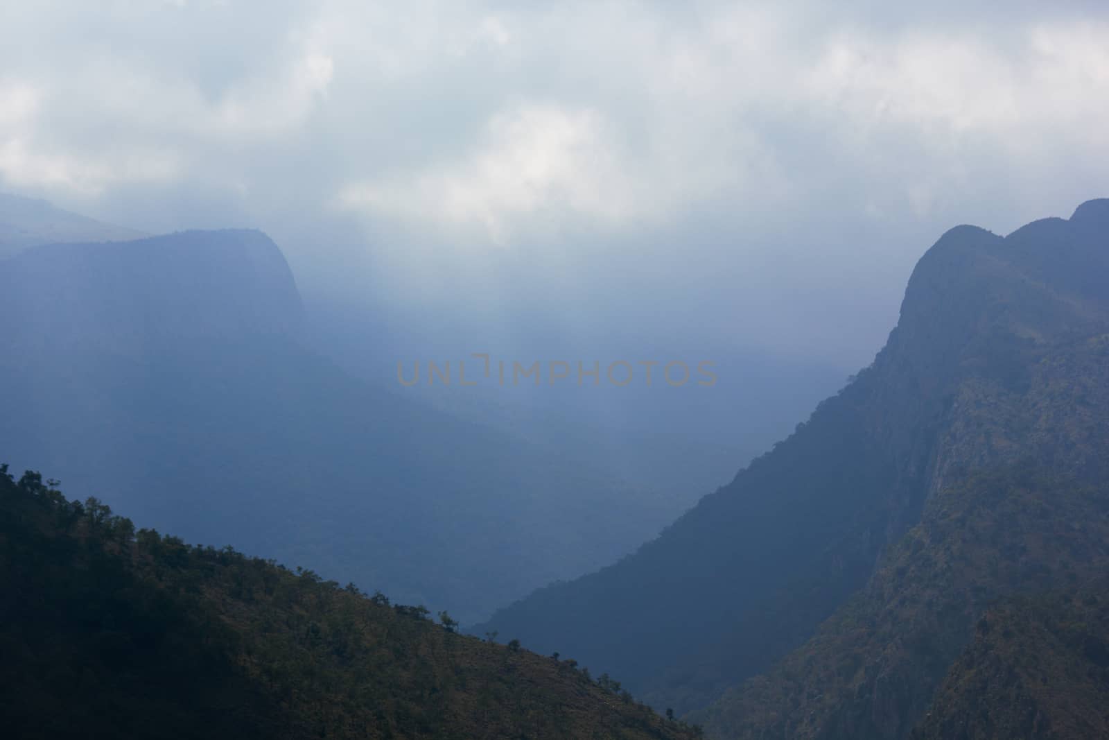 Misty Cloud Covered Mountains And Valleys by jjvanginkel