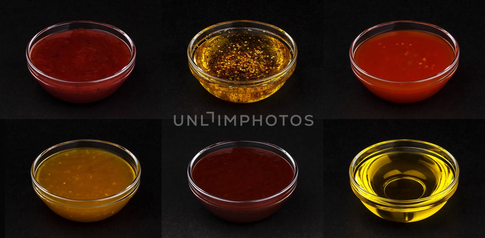 Set of different sauces isolated on black background