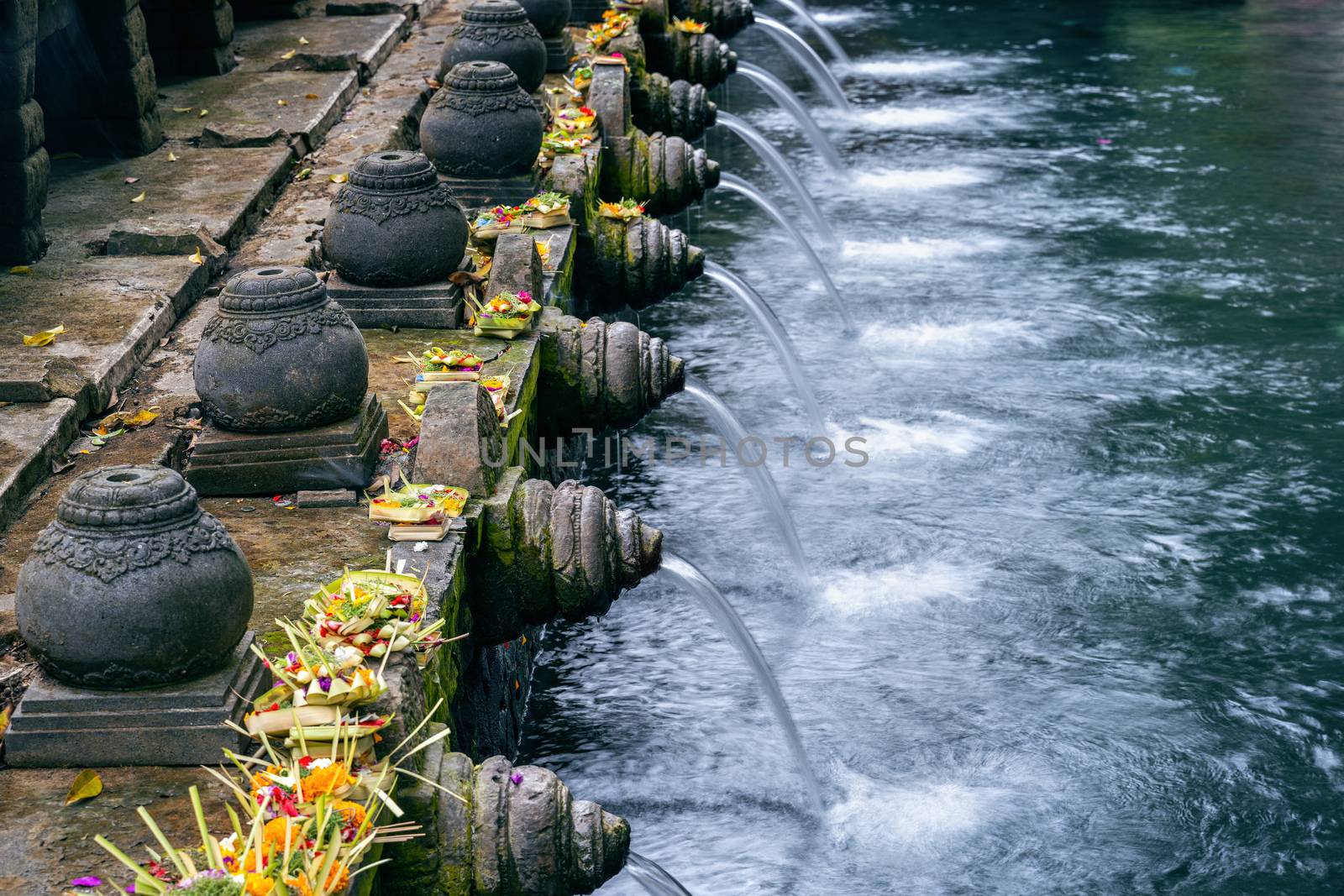 Holy spring water temple, Tirta empul temple in Bali, Indonesia. by gutarphotoghaphy