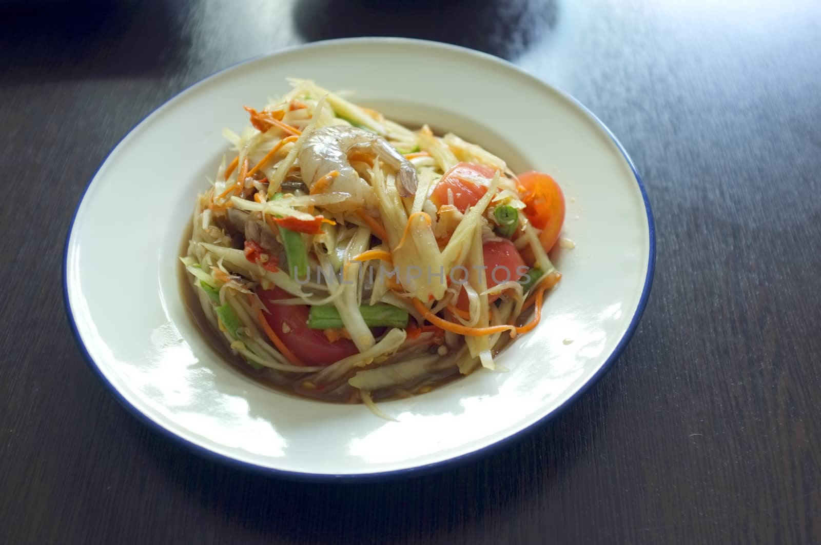 The famous local Thai street food ,Thai papaya salad or what we call " Somtum "