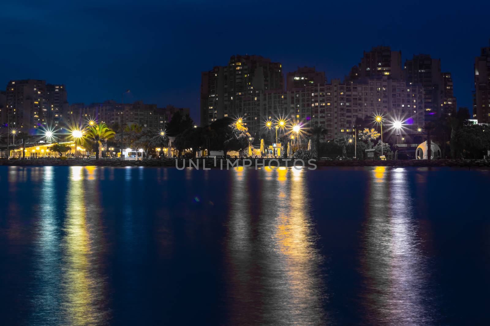 a wide long exposure cityscape shoot from izmir city - dark white dominated colors. photo has taken from izmir/turkey