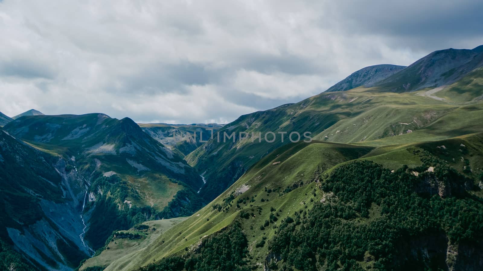 View of Kazbegi, Georgia. Beautiful natural mountain background by natali_brill