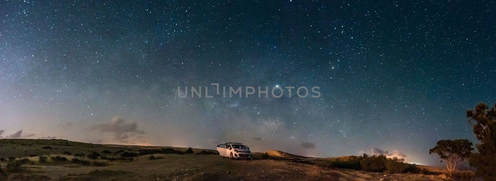 Milky way Panorama and white car in a park by javax